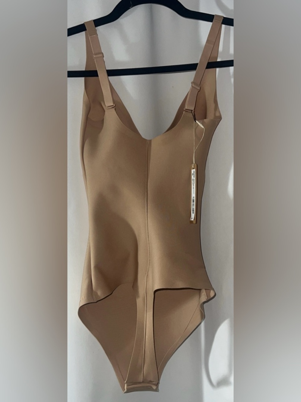 SKIMS Unlined Plunge Thong Bodysuit in Clay - Picture 2 of 5